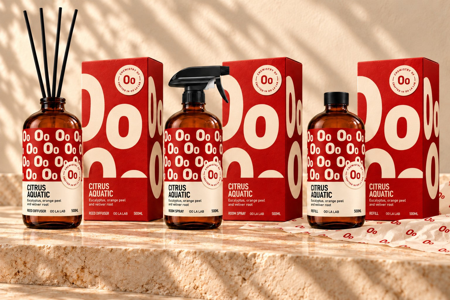 Red edition reed diffuser with long black reeds, room spray with black trigger and capped refill, all 500 ml